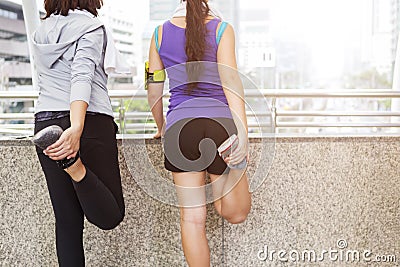 Sport exercise and workout for healthy concept. Peoples warmup before running Stock Photo