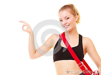 Sport. Fitness girl with gym bag showing ok hand sign Stock Photo