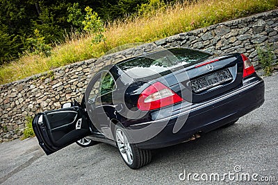 Sport german car - coupe - black metallic paint photo session in Editorial Stock Photo