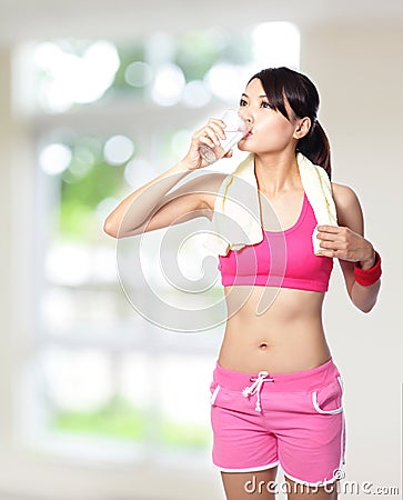 Sport girl drinking water Stock Photo
