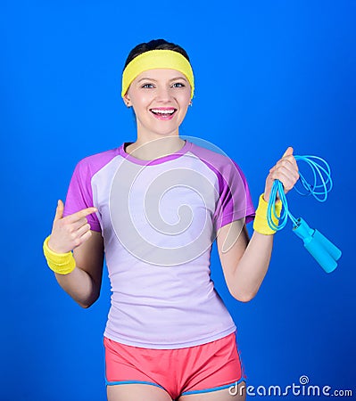 Sport jump rope equipment. Athletic fitness. Sporty woman training in gym with jump rope. Health diet. Success. Strong Stock Photo