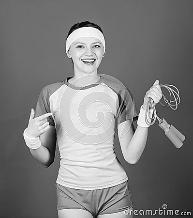 Sport jump rope equipment. Athletic fitness. Sporty woman training in gym with jump rope. Health diet. Success. Strong Stock Photo