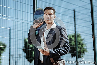 Reflective male student visiting skatepark after classes Stock Photo