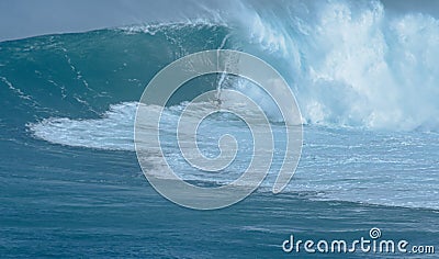 Sport photography. Jaws swell on International surfing event in Maui, Hawai 2021 December. Editorial Stock Photo