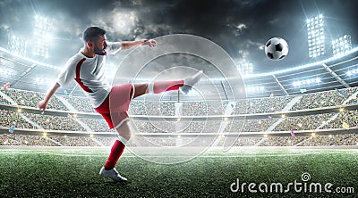 Sport. Professional soccer player kicking a ball. Night 3d stadium with fans and flags. Soccer concept. Soccer action Stock Photo