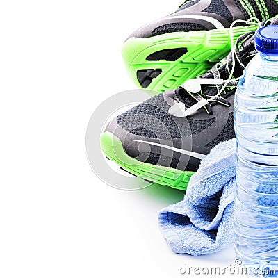 Sport shoes and water bottle. Fitness concept Stock Photo