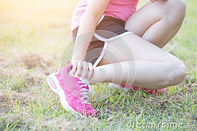 Sport woman ankle injury Stock Photo