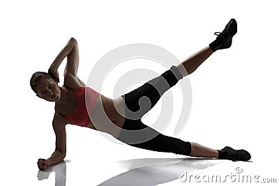 Sport woman doing abs and legs exercise, silhouette studio shot Stock Photo