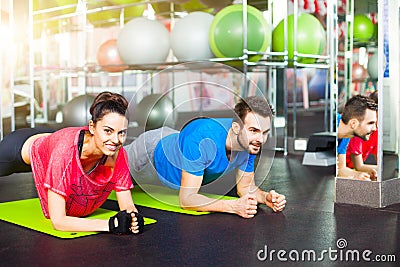 Sport - young fitness couple, crossfit training Stock Photo