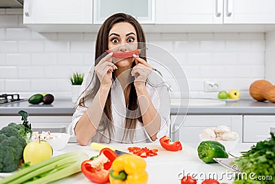 Sportive Brunette Posing With a Chili Pepper Moustache Stock Photo