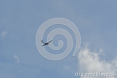 sports airplane small passing blue sky germany Stock Photo