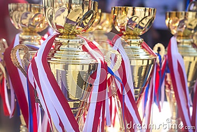 Sports awards cups and medals at competitions. Prizes awarded champions of sports competitions. Cup and Bedal. Stock Photo