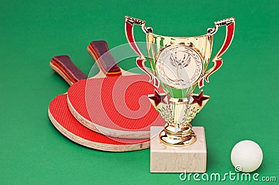 Sports awards and tennis racquets Stock Photo