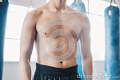 Sports, boxing and abdomen of man with muscle in gym for training, workout and exercise for mma. Fitness, body builder Stock Photo