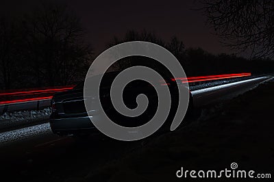 Car inside gray seats red dashboard night photography in the dark Stock Photo