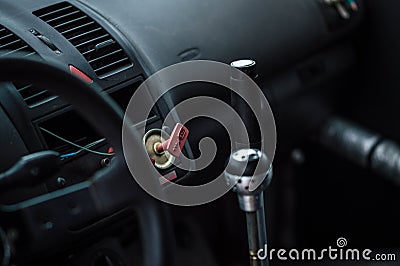 Car inside gray seats red dashboard night photography in the dark Stock Photo