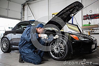 Sports car in a workshop Stock Photo