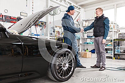 Sports car in a workshop Stock Photo