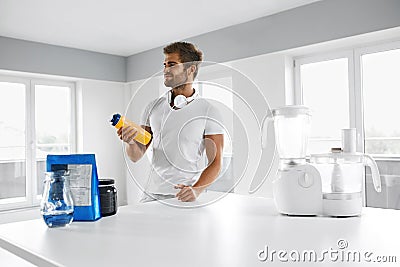 Sports Energy Drink. Man With Bodybuilding Supplements Beverage. Stock Photo