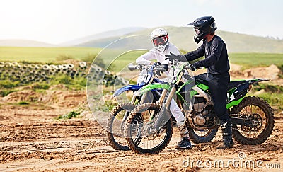 Sports, friends and men with motorcycle in countryside for fun, hobby and stunt training, practice or freedom. Off road Stock Photo