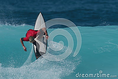 Sports man surfing wave Editorial Stock Photo