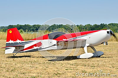 Sports model aircraft takes off from airfield Stock Photo