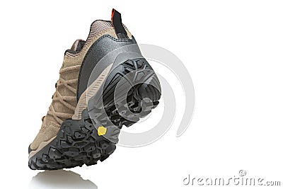 Sports shoe as if striding on a white surface, casting a shadow, back side, the concept of an active lifestyle Stock Photo