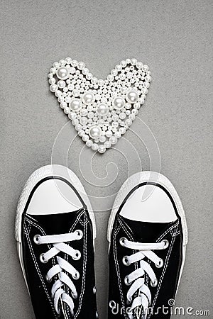 Valentines day flat lay banner. Chucks and pearls female concept. Stock Photo