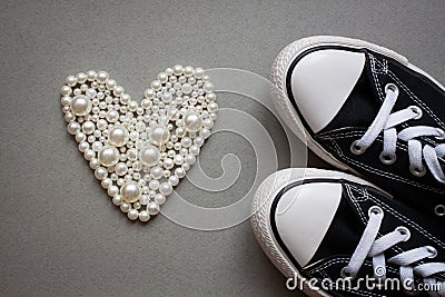 Valentines day flat lay banner. Chucks and pearls female concept. Stock Photo