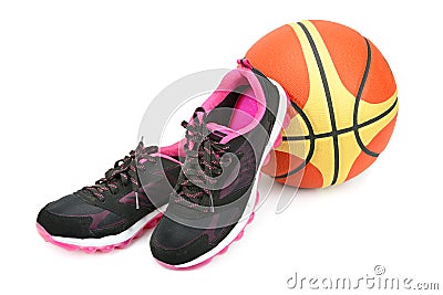 Sports sneakers and basketball Stock Photo