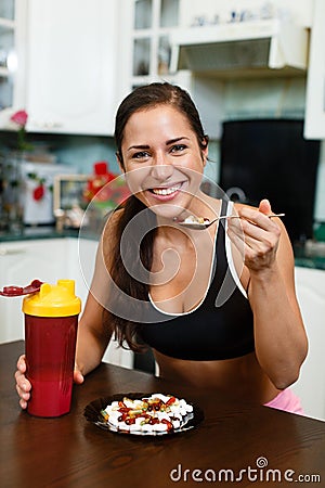 Sports woman and nutritional supplements. Stock Photo