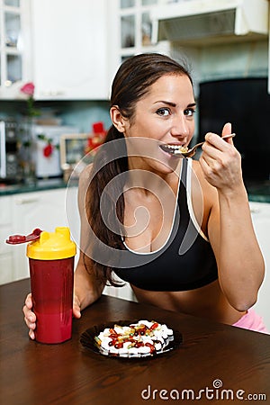 Sports woman and nutritional supplements. Stock Photo