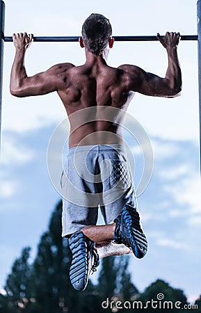 Sportsman dangling on rod Stock Photo