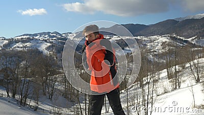 Sportsman freezing outside in a very cold winter day at the mountains stock video Sportsman freezing outside in a very cold winter day at the mountains stock video