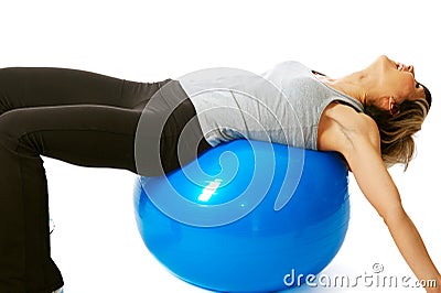 Sportswoman having fun with a Fitness Ball Stock Photo