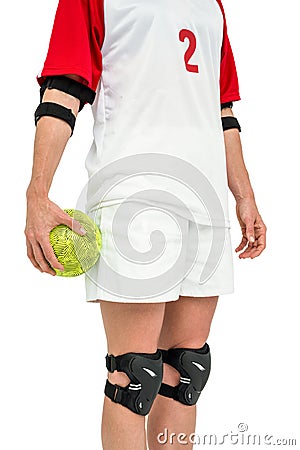 Sportswoman holding a ball Stock Photo