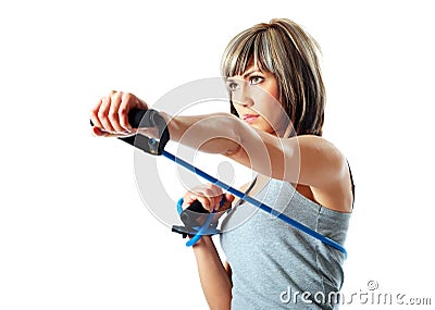 Sportswoman with resistance band Stock Photo