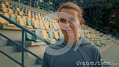 Sportswoman runner caucasian woman jogger running marathon race on city stadium active sporting life cardio exercise Stock Photo