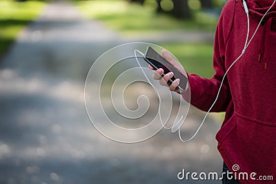 Sportswoman with smartphone count calories. Healthy life concept Stock Photo