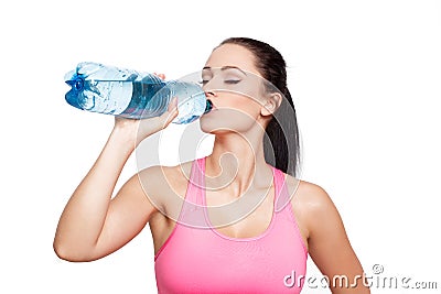 Sporty brunette woman drink water Stock Photo