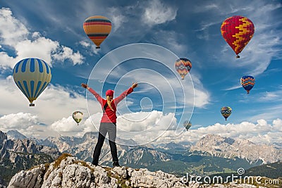 Sporty girl and hot air balloons. Freedom, achievement, achievement, happiness Stock Photo