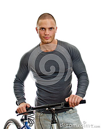 Sporty male with bicycle. Stock Photo