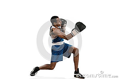 Sporty man during boxing exercise making hit. Photo of boxer on white background Stock Photo