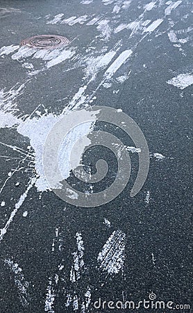 Spot of white paint on the urban asphalt road Stock Photo