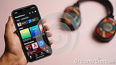 Spotify music app on the smartphone, app for music, radio and podcast streaming Editorial Stock Photo