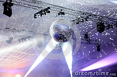 Spotlight on mirrored disco ball Stock Photo