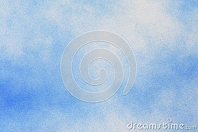 a spray paint blue over paper white Stock Photo