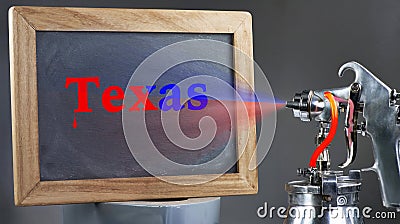 Spray Painting Texas. Stock Photo