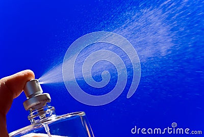 Spraying perfume Stock Photo