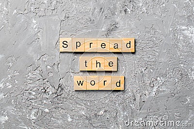 Spread the word word written on wood block. Spread the word text on table, concept Stock Photo